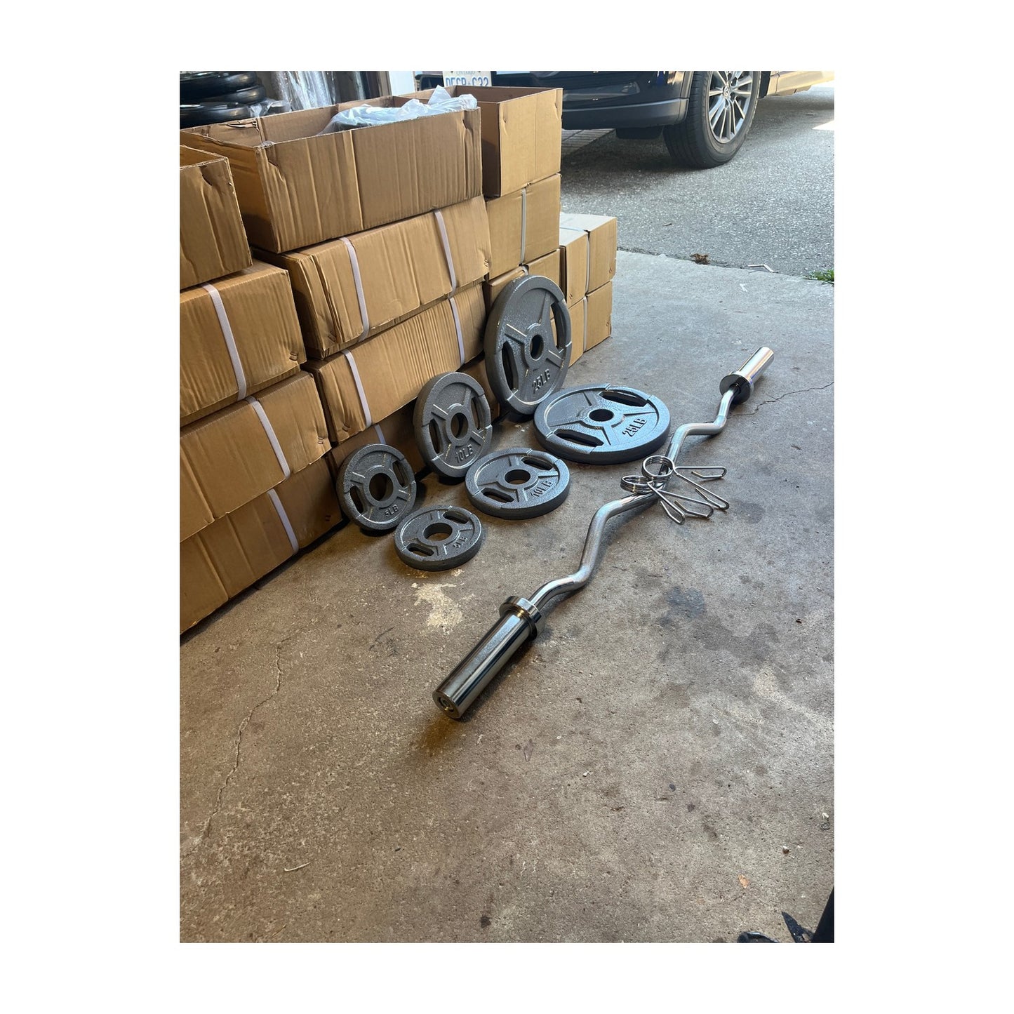 Olympic EZ Curl Bar + Cast Iron Plates Bundle